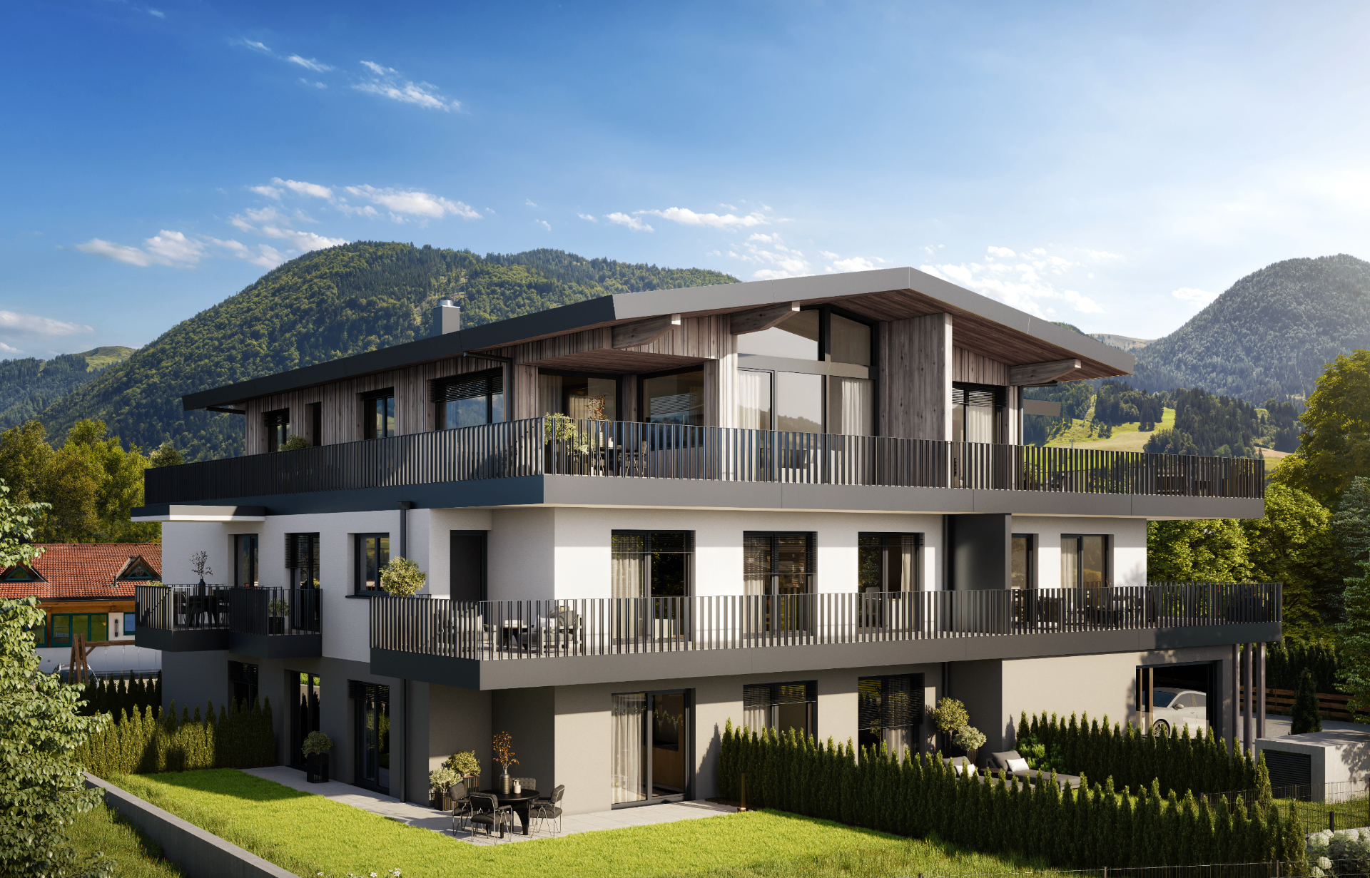 K5 Living — Rückansicht mit Garten und Terrassen